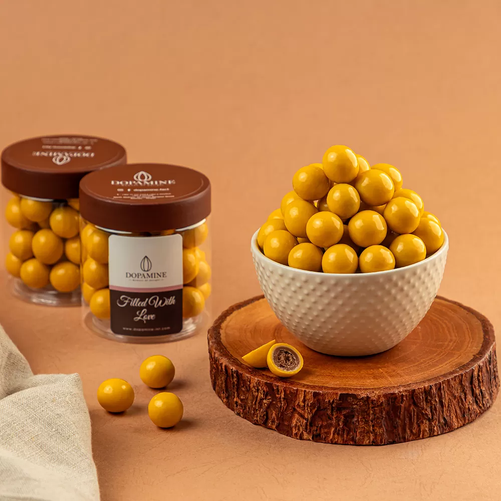 Crunchy Chocolate Coated With Passion Fruit Chocolate 179Gm